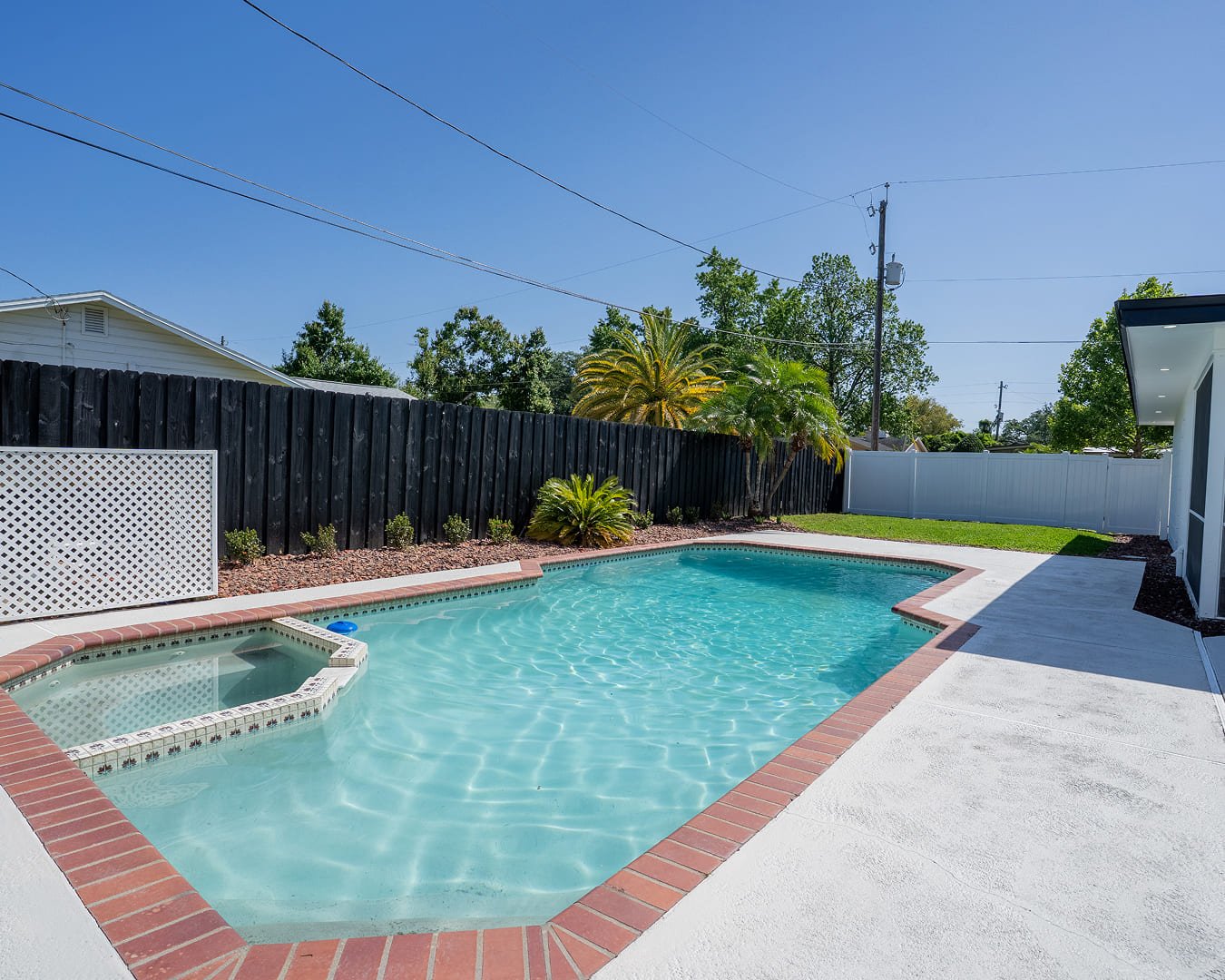 DryProTek finished pool renovation with spa and paver deck