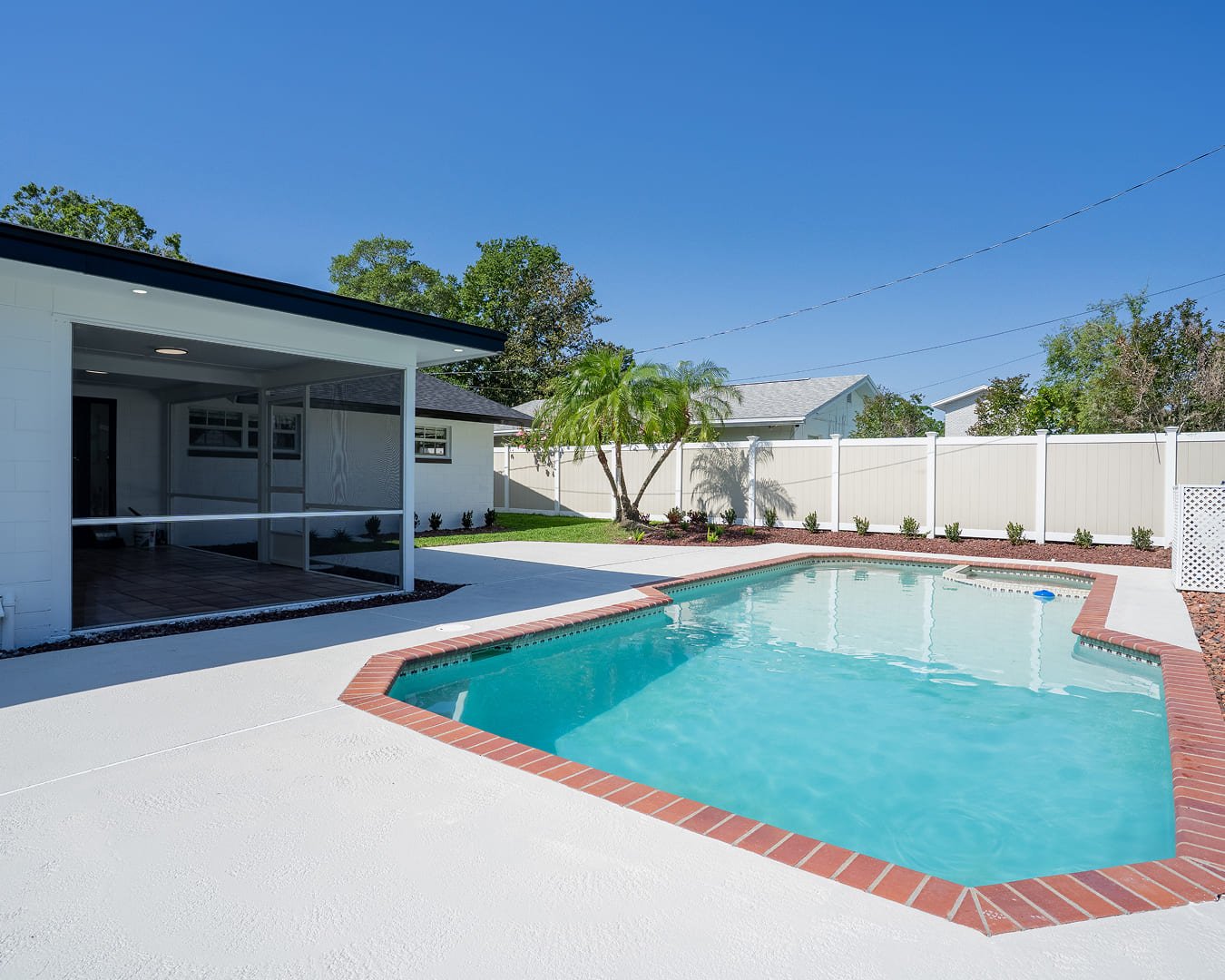 DryProTek pool area renovation with new deck and screen enclosure